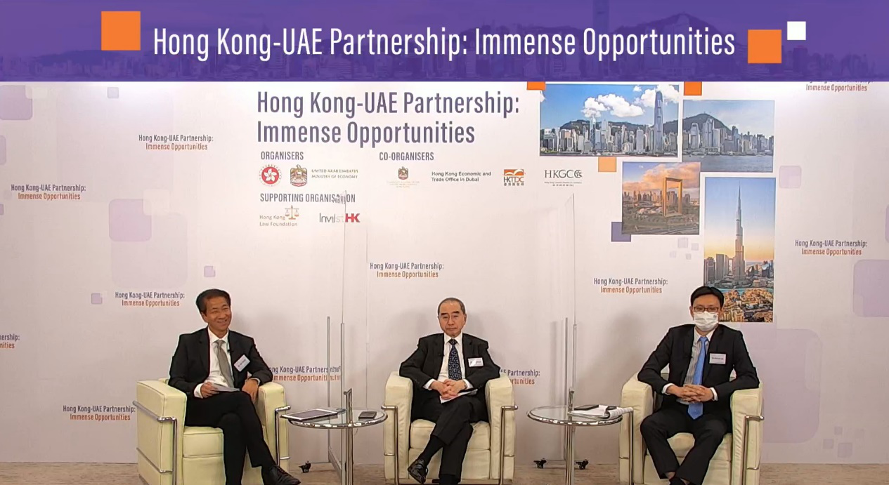 The Commissioner for Belt and Road, Mr Rex Chang (left), and panelists [the Chairman of the Hong Kong Law Foundation, Mr Larry Kwok (middle) and Deputy Executive Director of the Hong Kong Trade Development Council, Dr Patrick Lau (right)] participating in the panel discussion at the webinar.